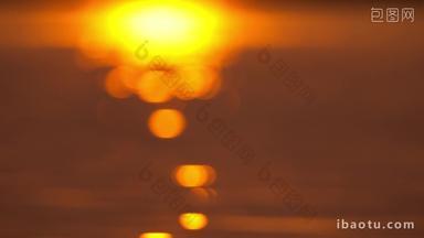 夕阳水面海面波光粼粼太阳倒影